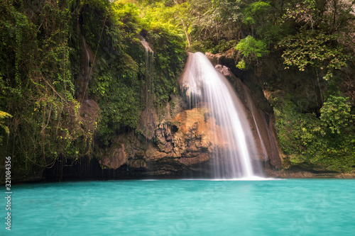 Fototapeta Naklejka Na Ścianę i Meble -  Kawasan falls in Badian on island cebu in philippines. perfect for canyoning swimming. Blue turquoise water 2020