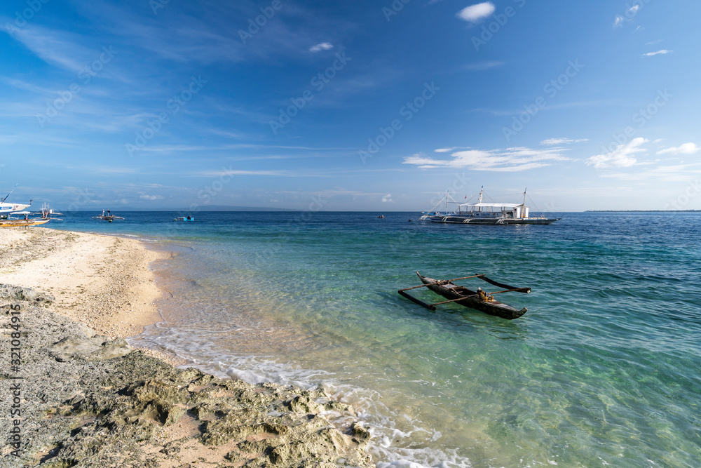 liloan beach on cebu, philippines. blue nice water for swimming relaxing snorkeling