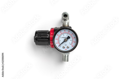 Pressure gauge of air compressor isolated on white background.