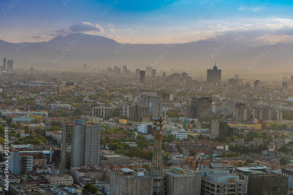 Panorama of Mexico city central part  from skyscraper Latino americano. View with buildings. Travel photo, background, wallpaper. Toned photo.