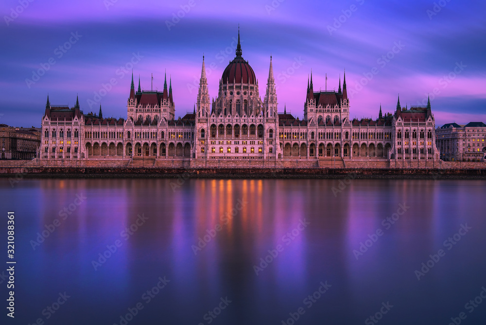 Hungarian Parliament Building in Budapest at sunset with Danube river