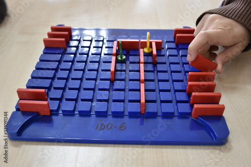 a board game and playing hand