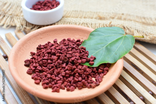 Fototapeta Naklejka Na Ścianę i Meble -  Achiote seed called Bixa orellana of America, used to flavor food