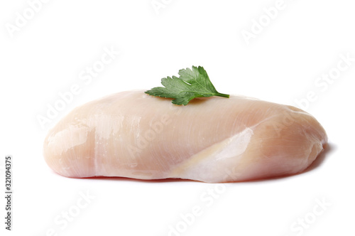 raw chicken fillet with parsley isolated on a white background