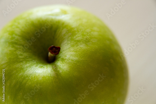 Green Apple close-up on a white background