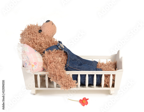 Фотография Lovesick depressed Teddy bear in bed
