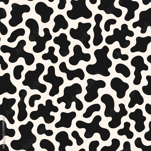 Cow print seamless pattern. Abstract background with irregular shapes,  animal skin texture for fabric, wallpaper. Vector illustration Stock Vector