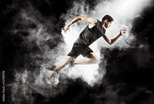 Canvas Print Sporty young man running