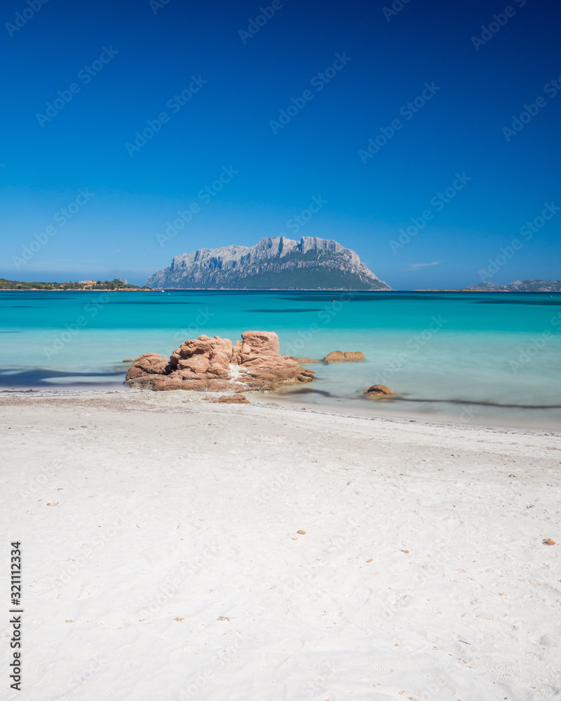 Clear water of sardinian beachs with view on Tavolara island Clear water of sardinian beachs with view on Tavolara island