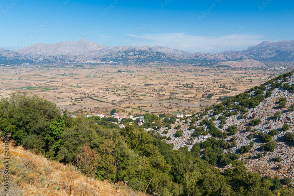 View on the towns of Plati and Magoulas on the Lasithi Plateau, Crete, Greece
