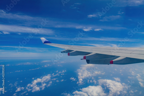 Sunny aerial sky landscape from and airplane window seat