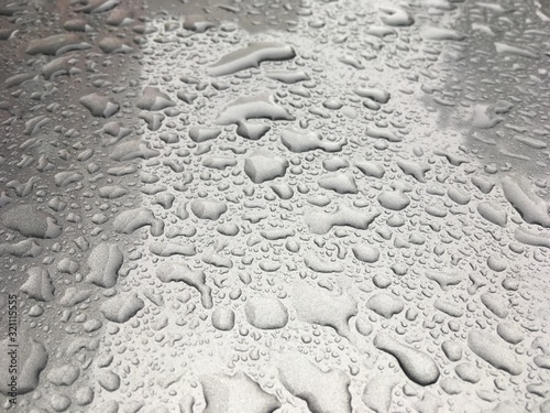 Raindrops on the surface. Wet surface. Drops.