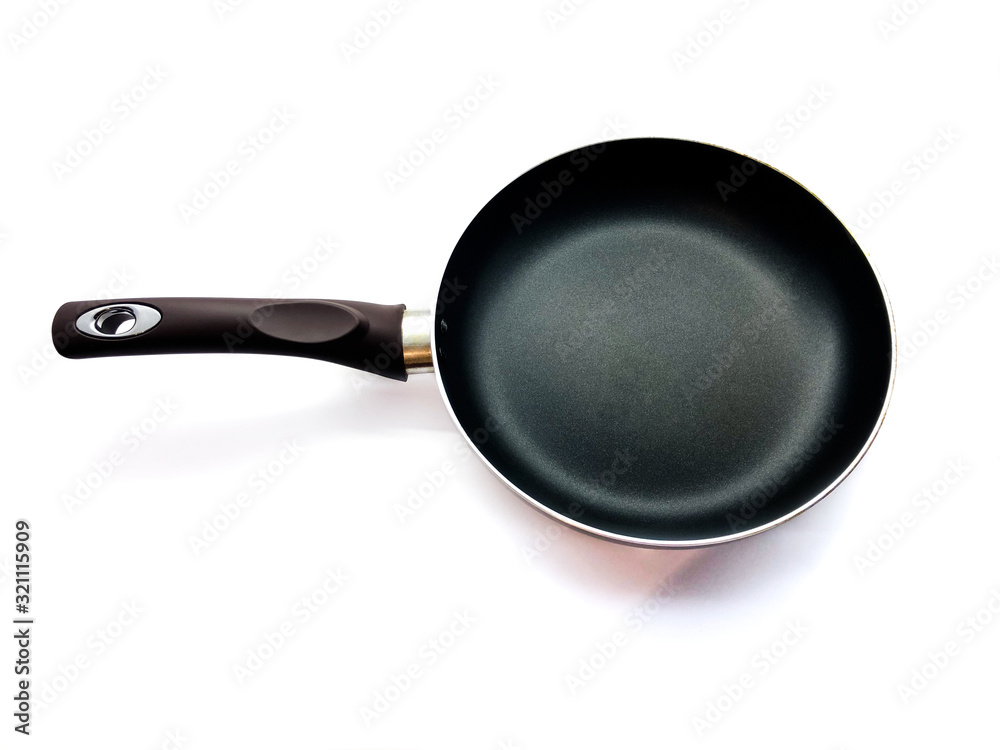 Frying pan isolated on a white background. Black frying pan. Aluminum pan for cooking. Fry. Professional frying pan for the cook. Frying pan isolated on a white background. Black frying pan. Aluminum pan for cooking. Fry. Professional frying pan for the cook.