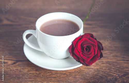 red roses and cup of coffee