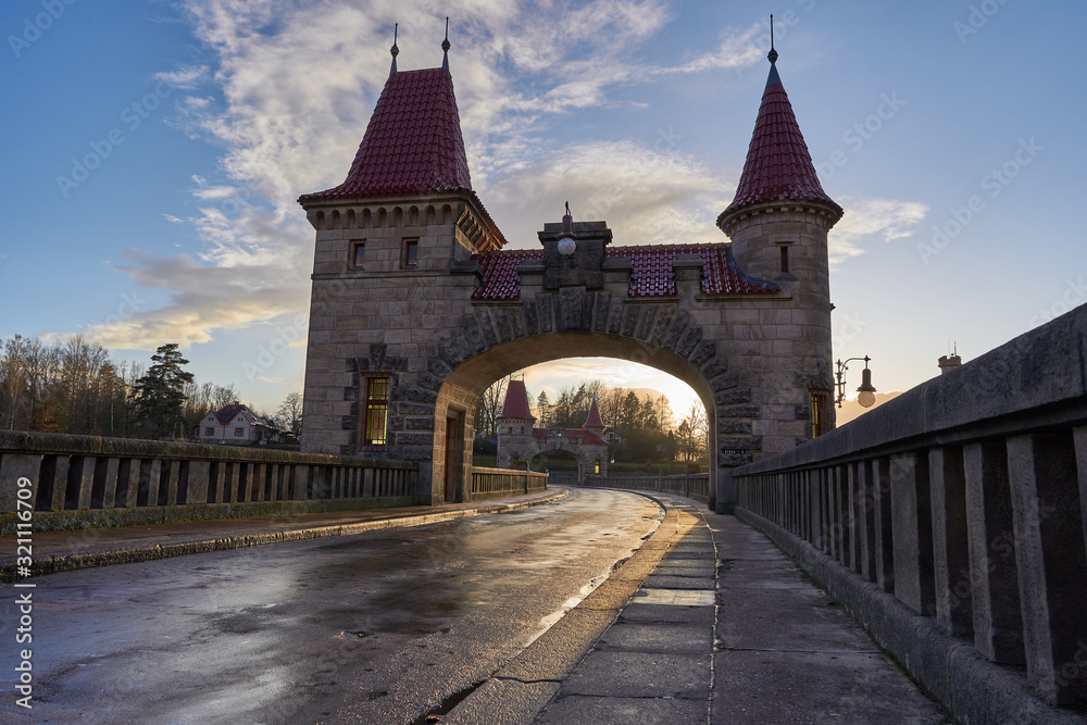 Fortified gate with two towers on the top of Beautiful historical dam Les kralovstvi in Czech Republic, build as a barrier against flooding and make electric power on biggest czech river Elbe.