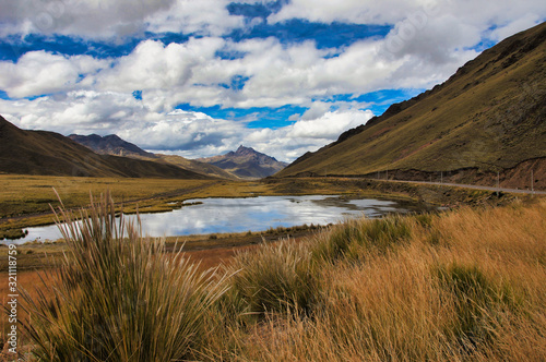 Panoramic view to Andes mountains at Abra La Raya pass with Lake - Puno, Anden, Peru
