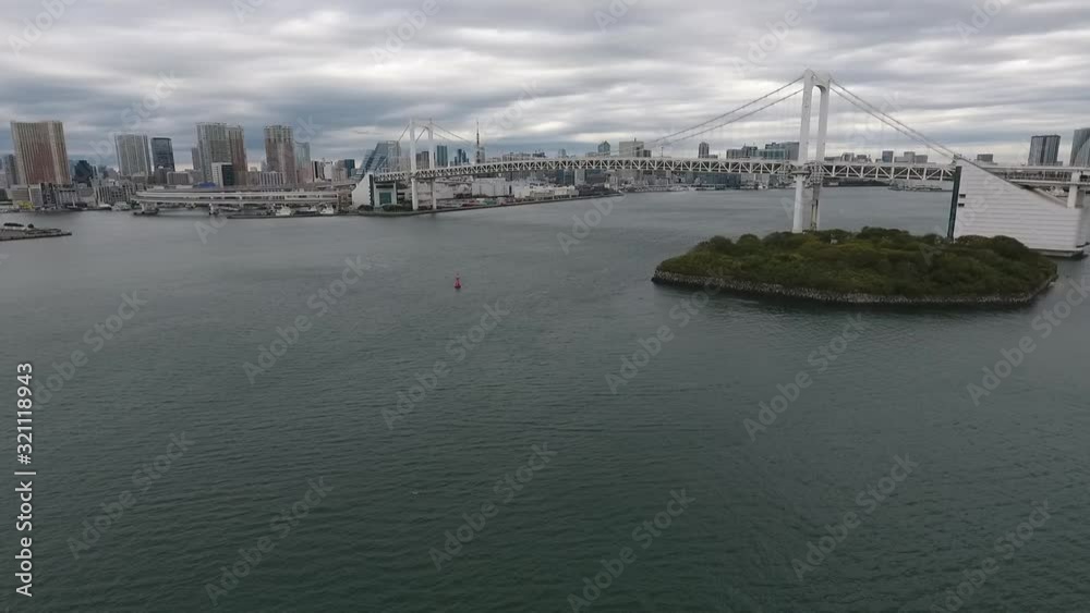 Tokyo - Fly toward Rainbow bridge and up on windy day - Aerial Tokyo - Fly toward Rainbow bridge and up on windy day - Aerial