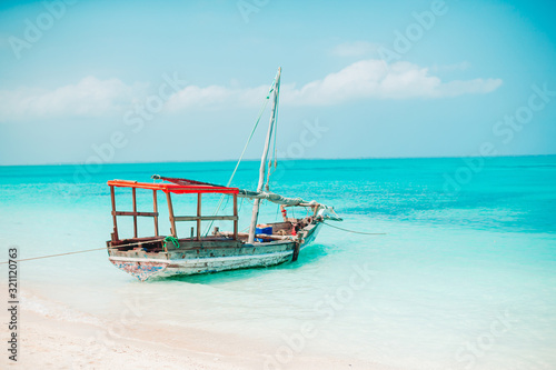 Beautiful cozy bay with boats and clear turquoise water © travnikovstudio