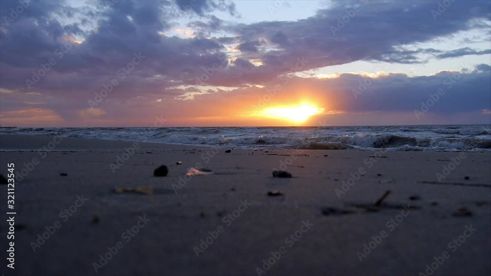 Waves near the beach in the sunset Waves near the beach in the sunset