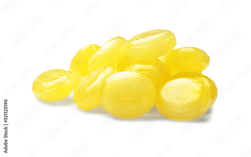 Fototapeta premium Tasty small lemon drops isolated on white