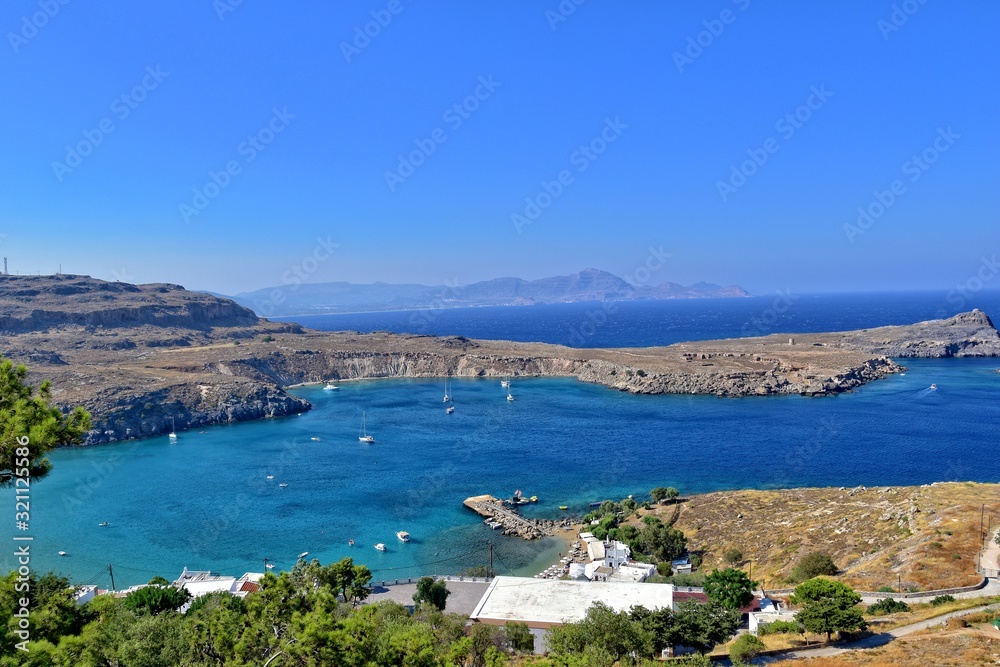 summer landscape of the Greek island of Rhodes with blue cloudless sky and sea