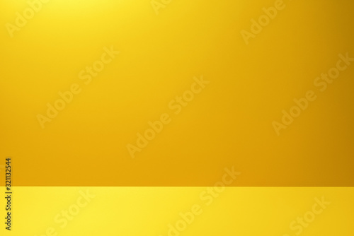 Yellow studio background for product placement