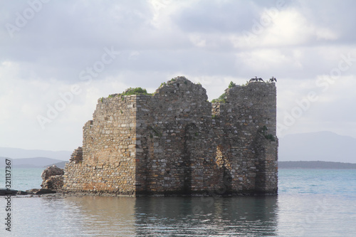 Ruined and restored castle at Iasos Turkey on the Aegean Sea near Bodrum  photo