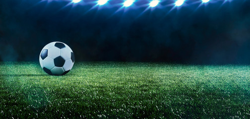 Football or soccer background with spotlights