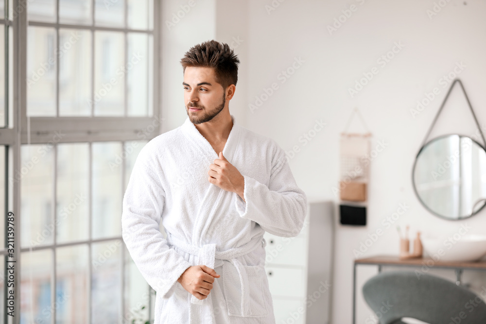Morning of handsome young man in bathroom Morning of handsome young man in bathroom