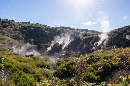 Fotografi Landscape view of volcanic sulfur fumes in Furnas do Enxofre on Terceira island,