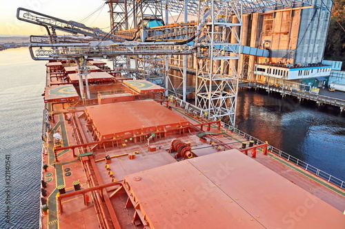 Cargo terminal for loading grain cargo by shore cranes. Port Tacoma,WA, USA. October, 2019.