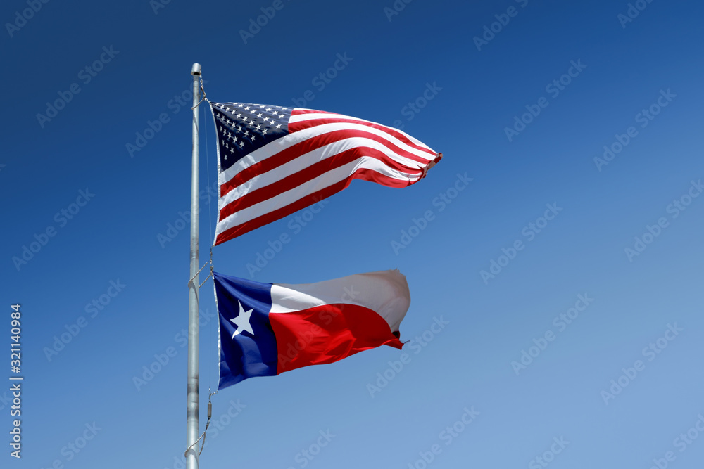 The flags of the United States and of the State of Texas on one flag-pole. The flags of the United States and of the State of Texas on one flag-pole.