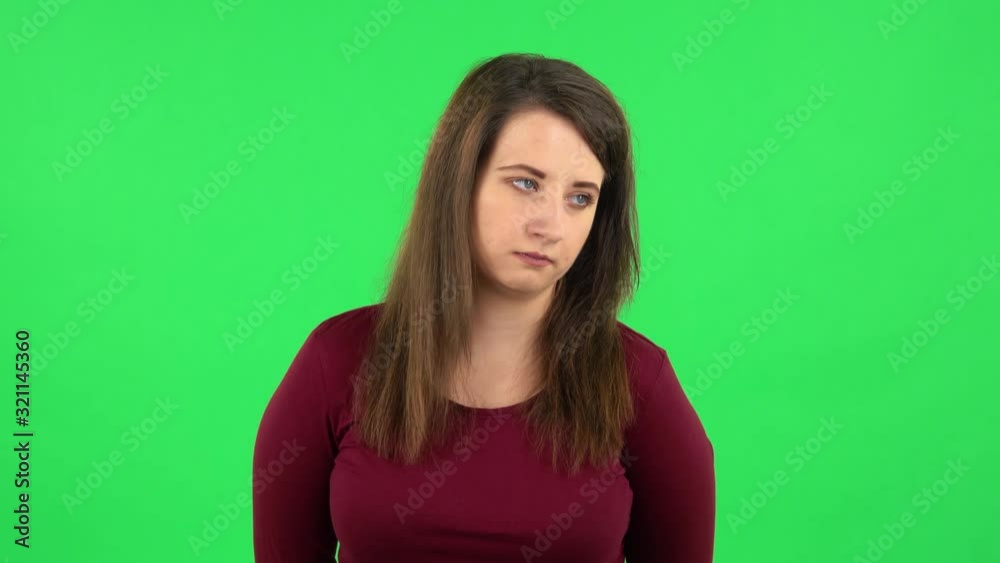 Portrait of pretty girl is waiting and yawning with boredom. Green screen Portrait of pretty girl is waiting and yawning with boredom. Green screen