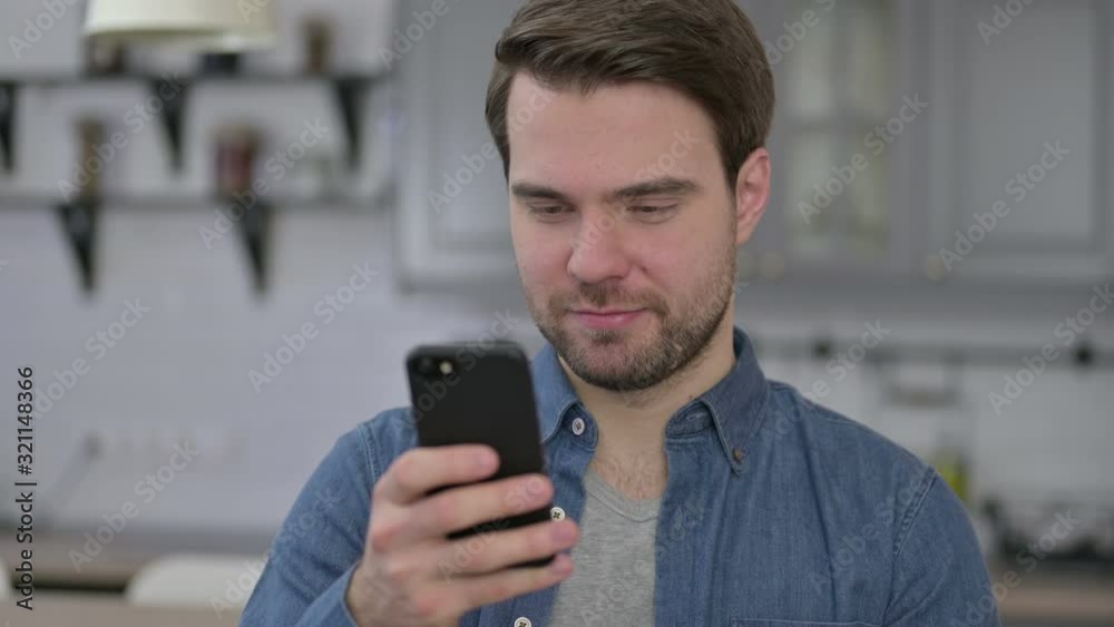 Portrait of Beard Young Man using Smartphone Portrait of Beard Young Man using Smartphone