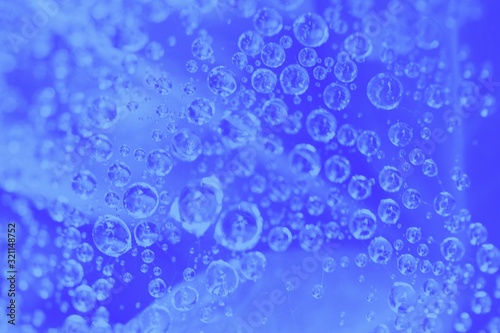 Blue gradient abstract background with water drops pattern