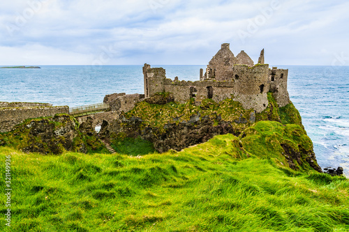 Ruins of Dunluce castle on the cliffs of the Atlantic Ocean in Northern Ireland