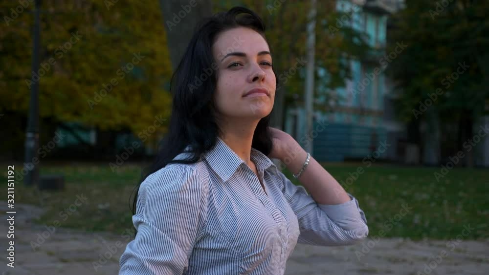 Business Woman Walks On Street Using Smart Phone. Resting Relaxing After Working Day Work Shift. Chatting on Smartphone. Evening City Downtown. 4K Slow Motion 60 fps Business Woman Walks On Street Using Smart Phone. Resting Relaxing After Working Day Work Shift. Chatting on Smartphone. Evening City Downtown. 4K Slow Motion 60 fps