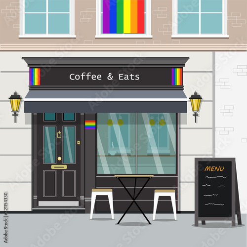The facade of the cafe in the European style with the symbols of LGBT.