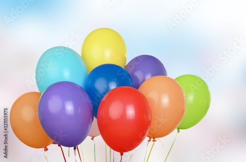 Bunch of colorful balloons on bokeh background
