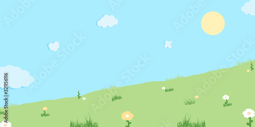 Nature green landscape. Sun and flower with grass at blue sky.