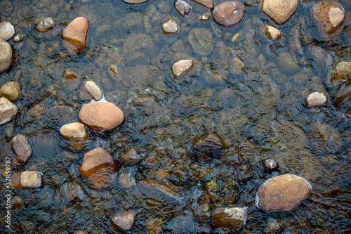 Top view photography of  river rocks captured at the El Valle river in the south of the department of Santander in Colombia photo