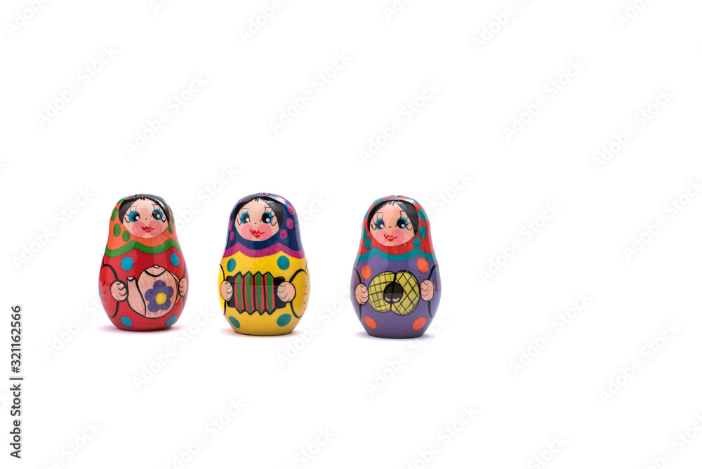 traditional russian souvenir matryoshka, three babushka doll in a row traditional russian souvenir matryoshka, three babushka doll in a row
