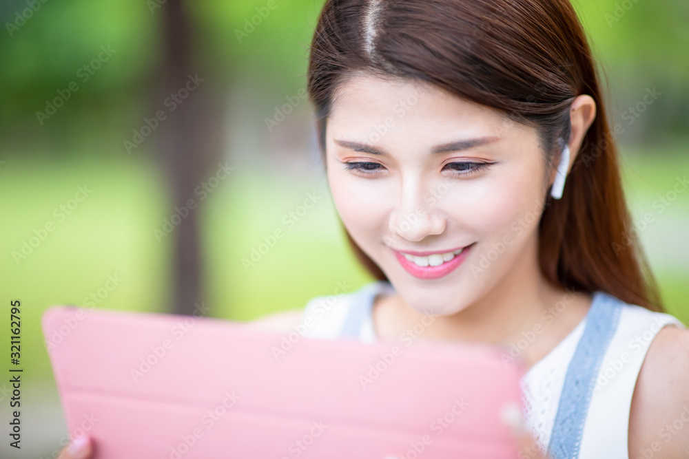 asian girl use tablet pc