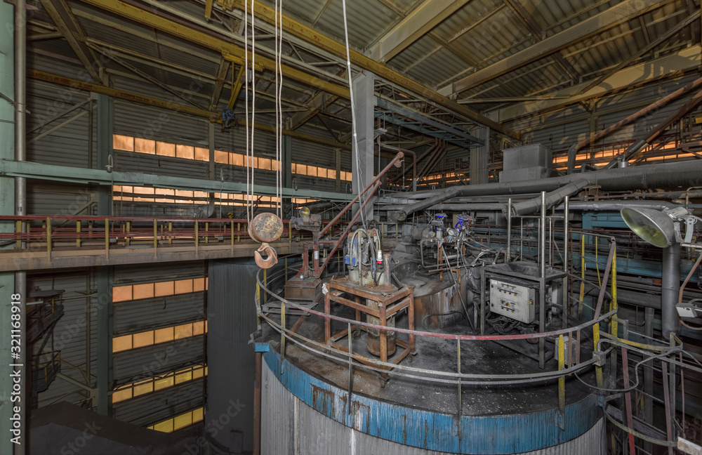 The top of the cylindrical gas treatment reactor with a variety of equipment. Absorption tower inside the waste incinerator plant The top of the cylindrical gas treatment reactor with a variety of equipment. Absorption tower inside the waste incinerator plant