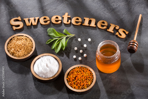 Photos Variety of natural sweeteners - Sweetener phrase.