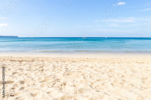 Blue sea and white sand beach, Phuket Island in south of Thailand, summer outdoor day light, relaxing and peaceful beach