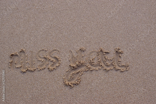  On the sand  there was a letter saying miss you
