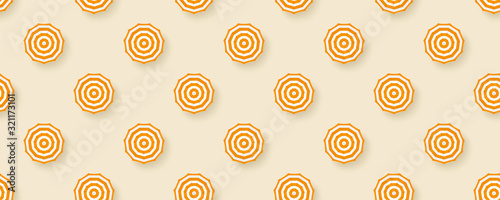 Seamless pattern with sun umbrellas isolated on long yellow background. Sun umbrellas with color pattern on summer sand. Template for fabric, wrapper, banners, creativity. Vector 3d illustration