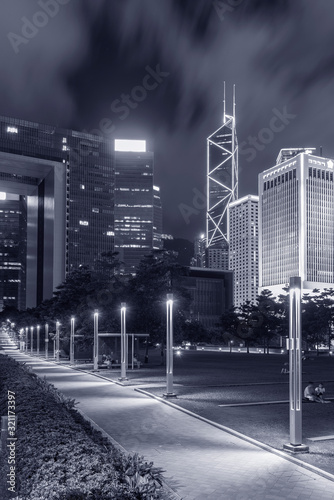 Promenade and skyline of Central district in Hong Kong city at night