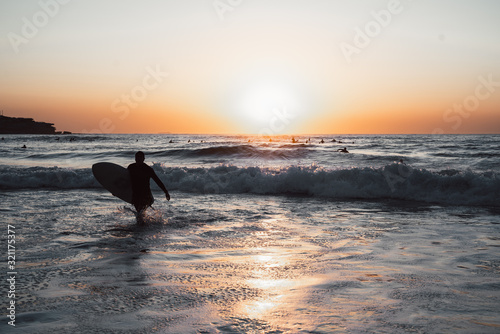 bondi beach surfer sunrise photo